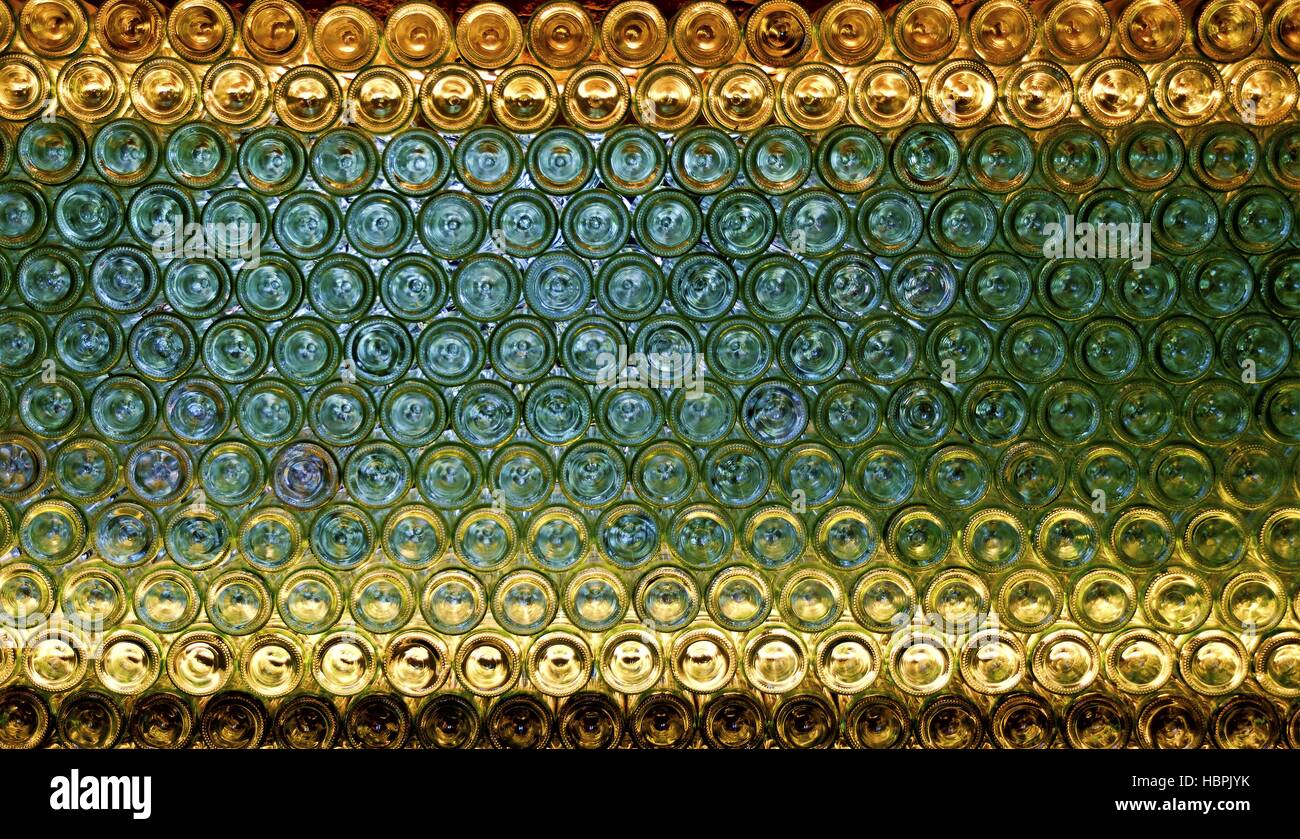 wall made by bases of wine bottles Stock Photo