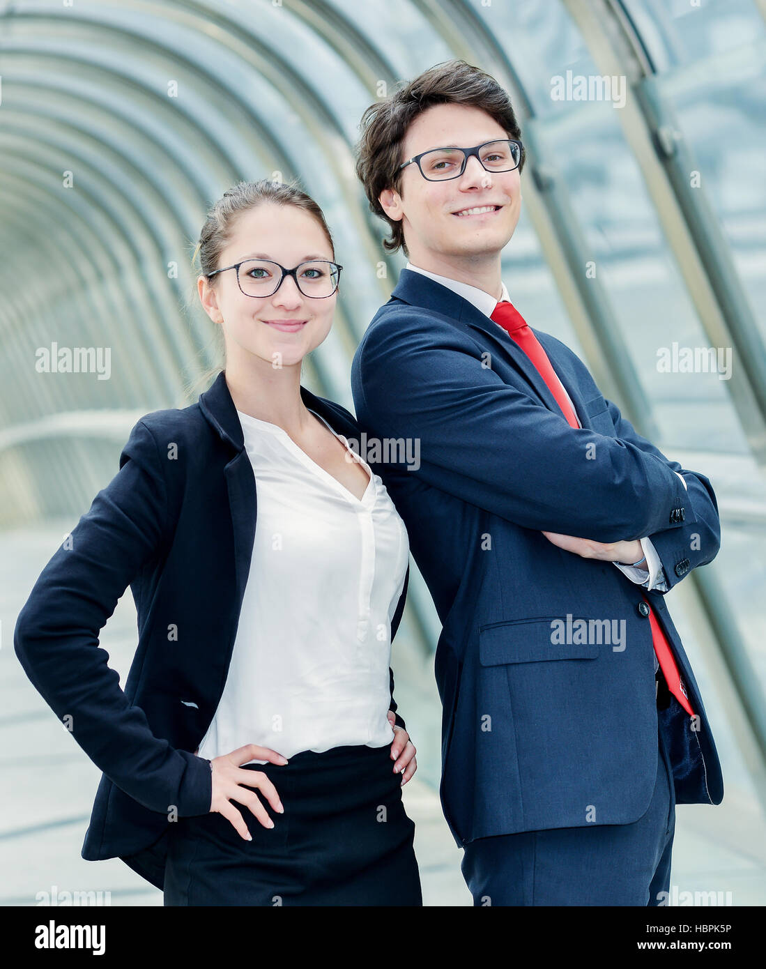 business partners posing back to back Stock Photo