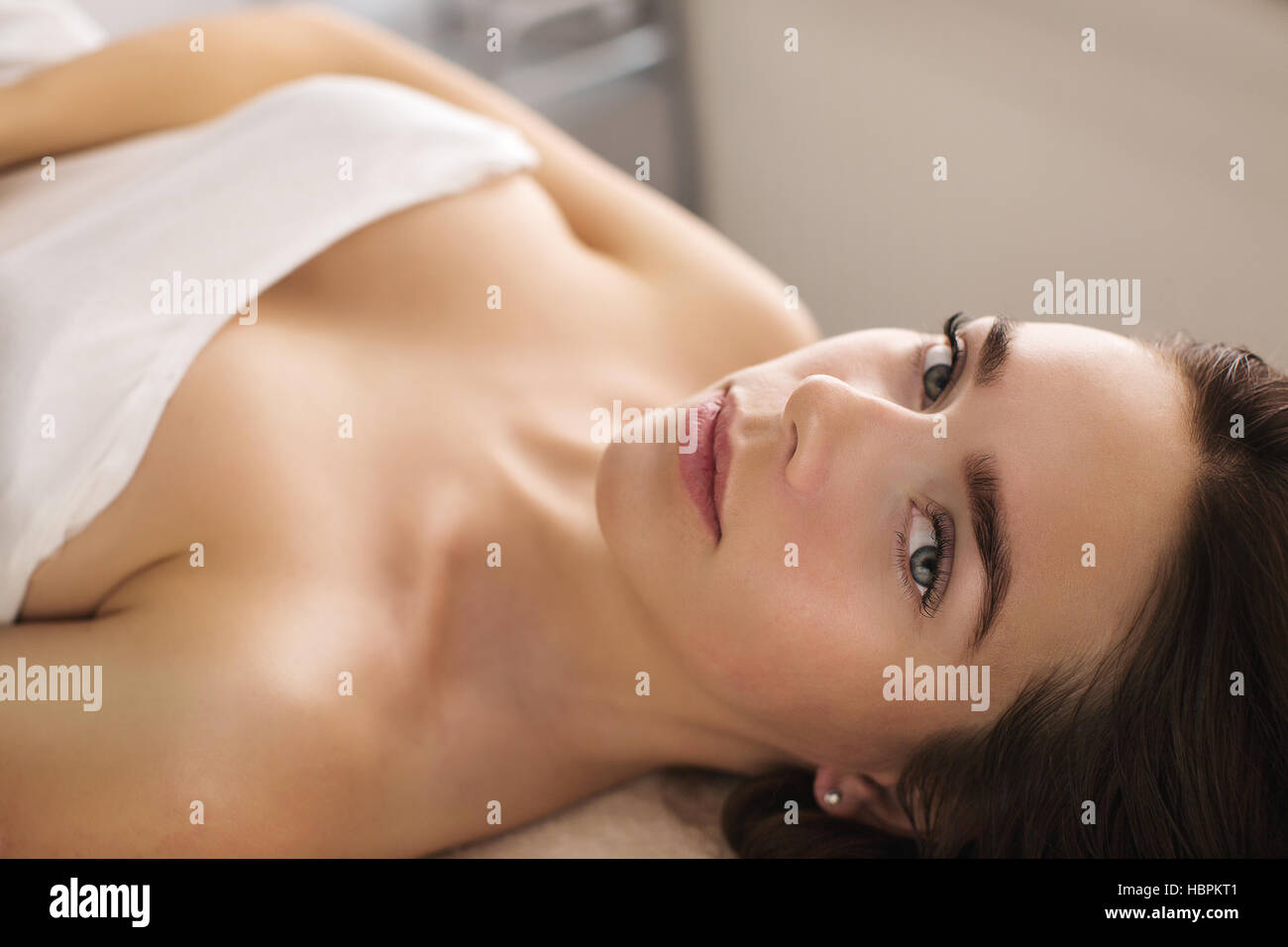 Woman is waiting for skin care treatment Stock Photo