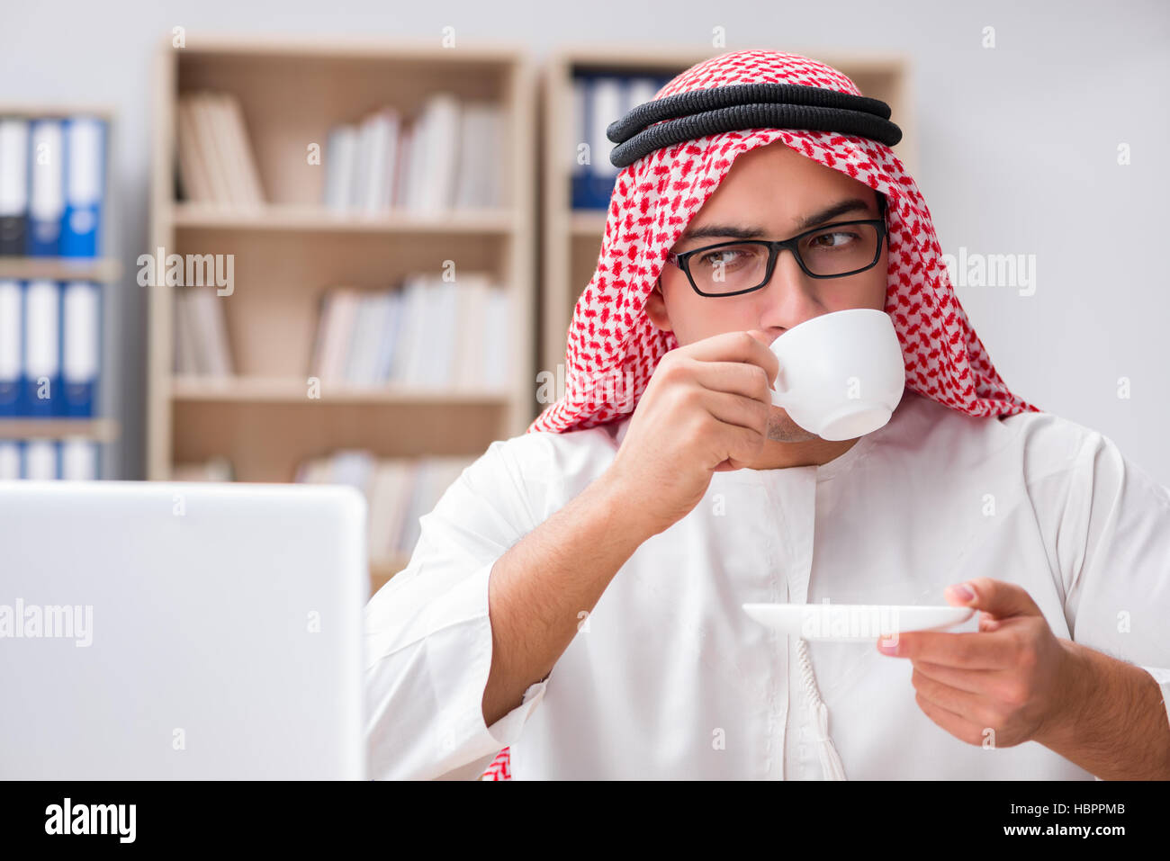 Arab businessman working in the office Stock Photo - Alamy