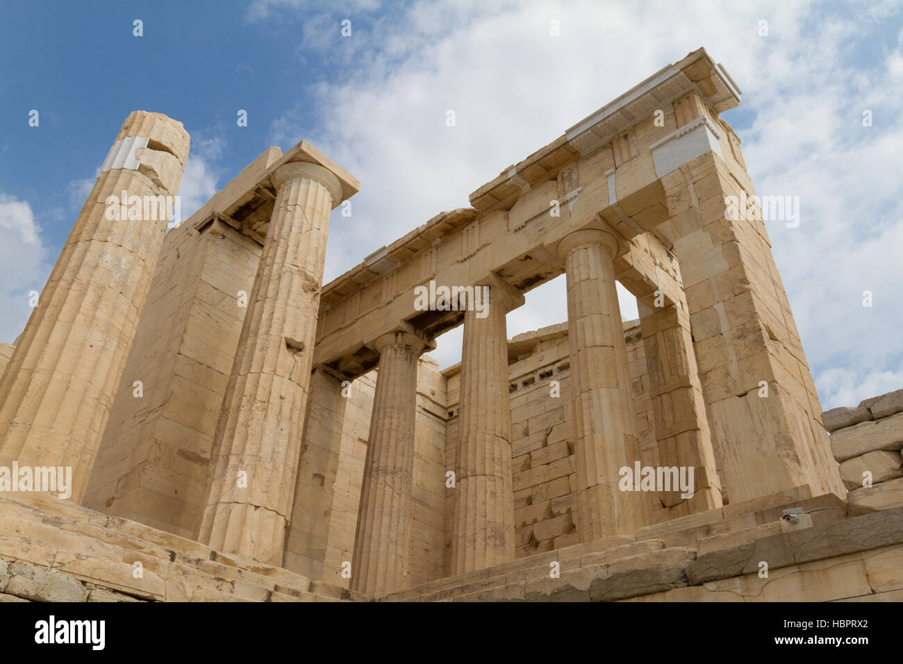 Columns of a temple on the Acropolis of Athens, Greece photographed from a low perspective Stock Photo