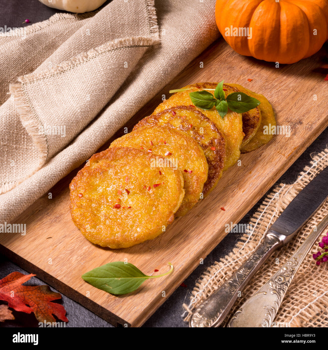 Potato pancakes with pumpkin puree Stock Photo