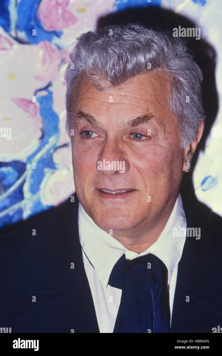 Tony Curtis actor showing a selection of his paintings in London 1989 Stock Photo