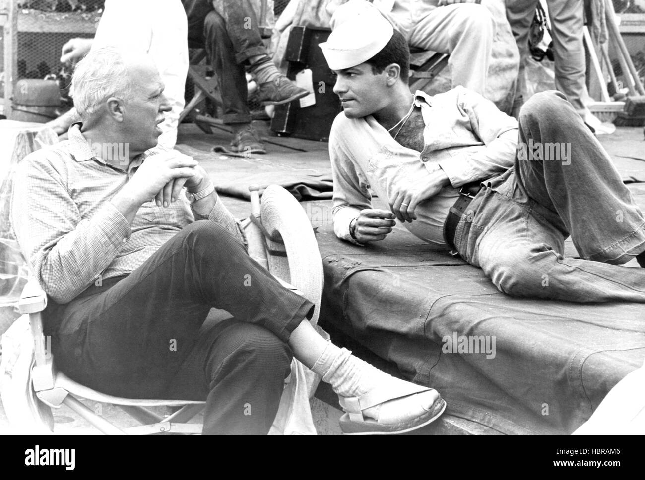 ENSIGN PULVER, producer/director Joshua Logan, Tommy Sands between scenes, 1964 Stock Photo