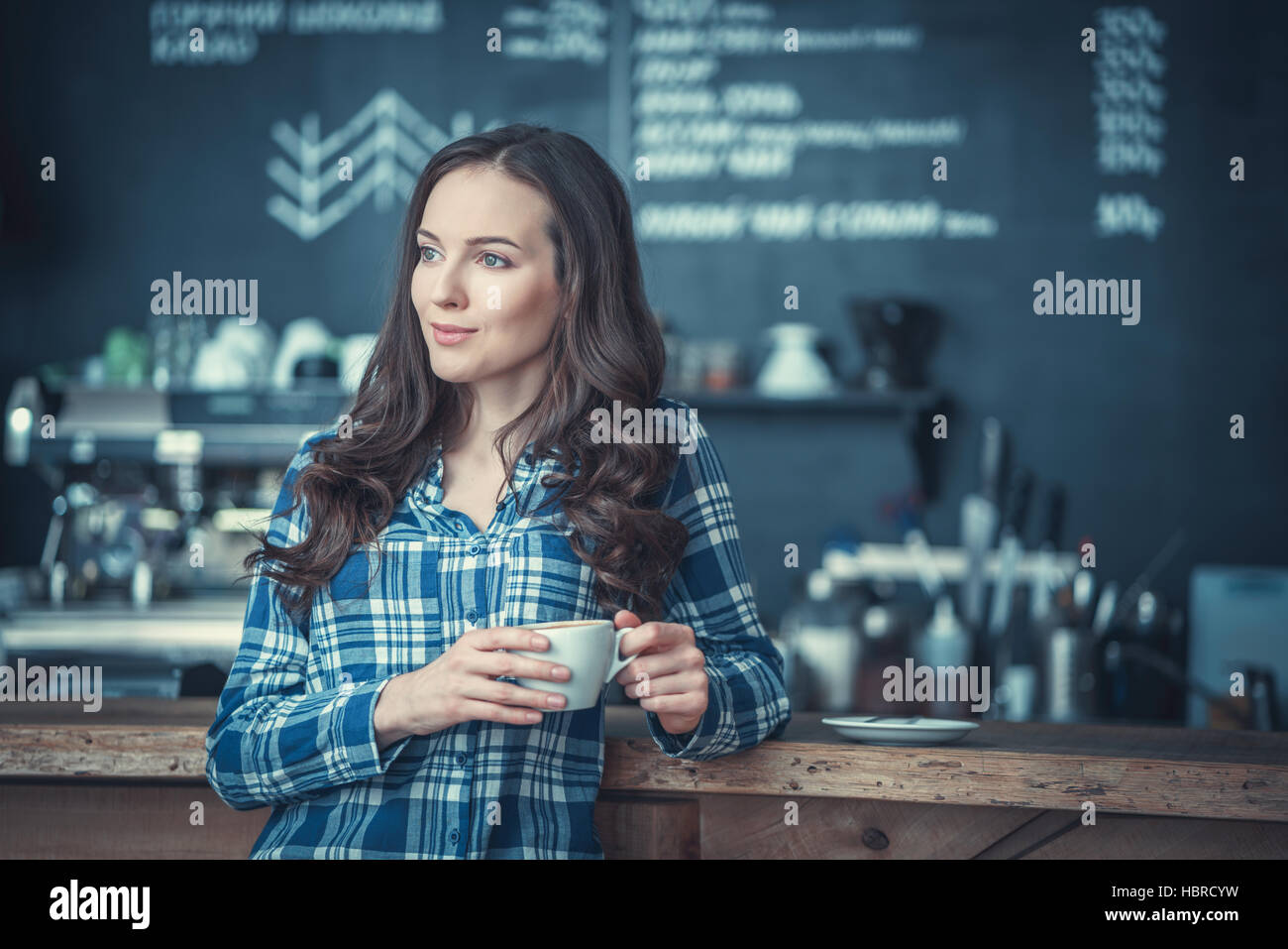 Young girl in a cafe Stock Photo