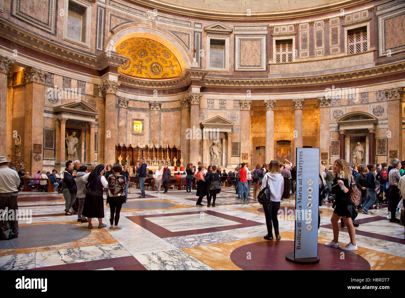 Rome, Pantheon interior, now Basilica di Santa Maria ad Martyres, towards the altar, with tourists and visitors Stock Photo