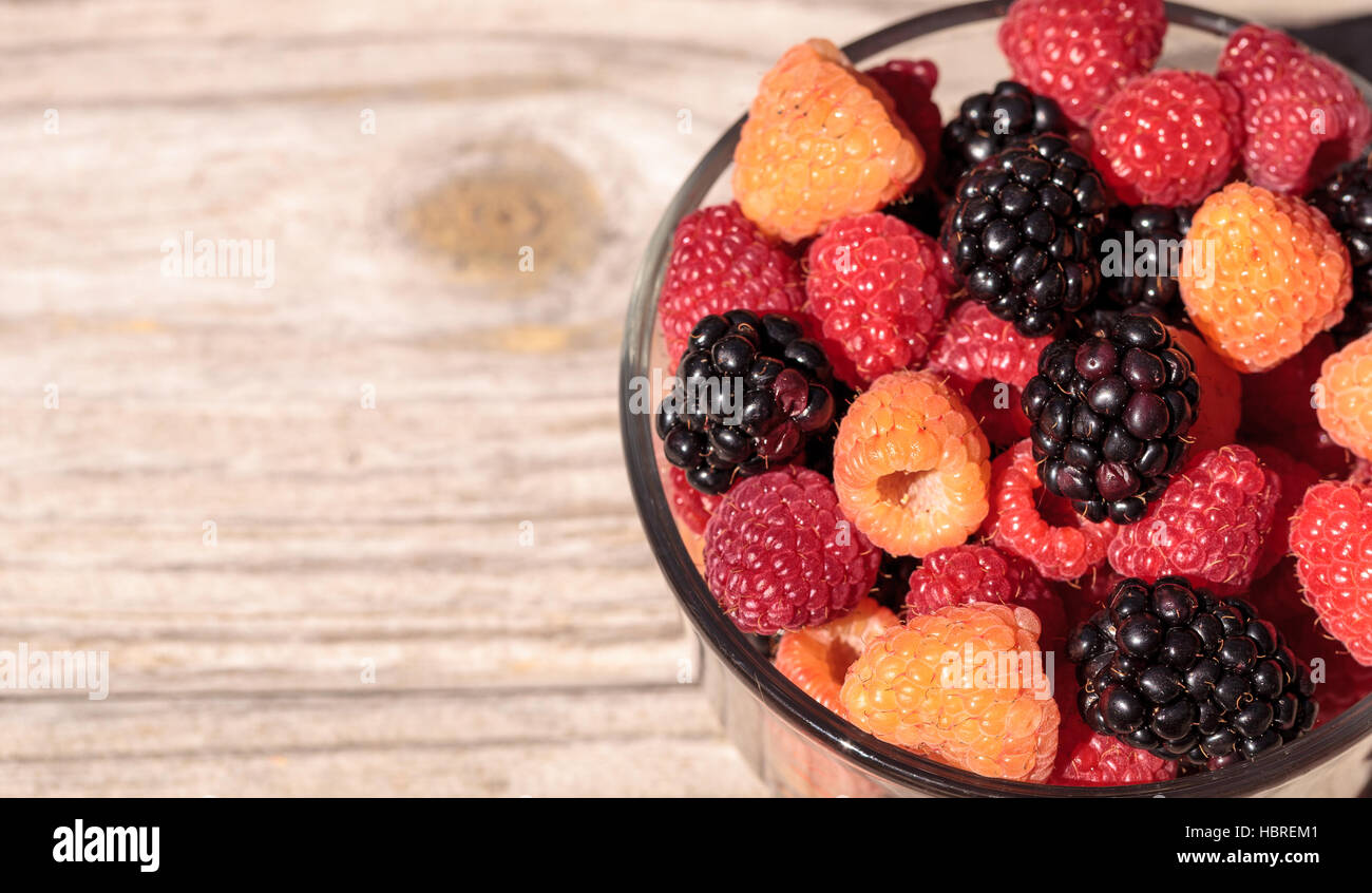 Organic golden and red raspberries mixed Stock Photo - Alamy