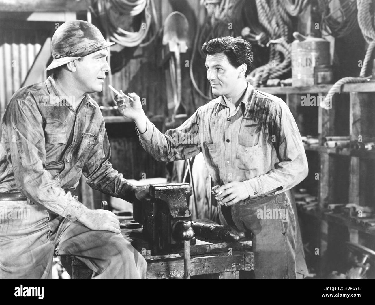 FLOWING GOLD, from left: Pat O'Brien, John Garfield, 1940 Stock Photo ...