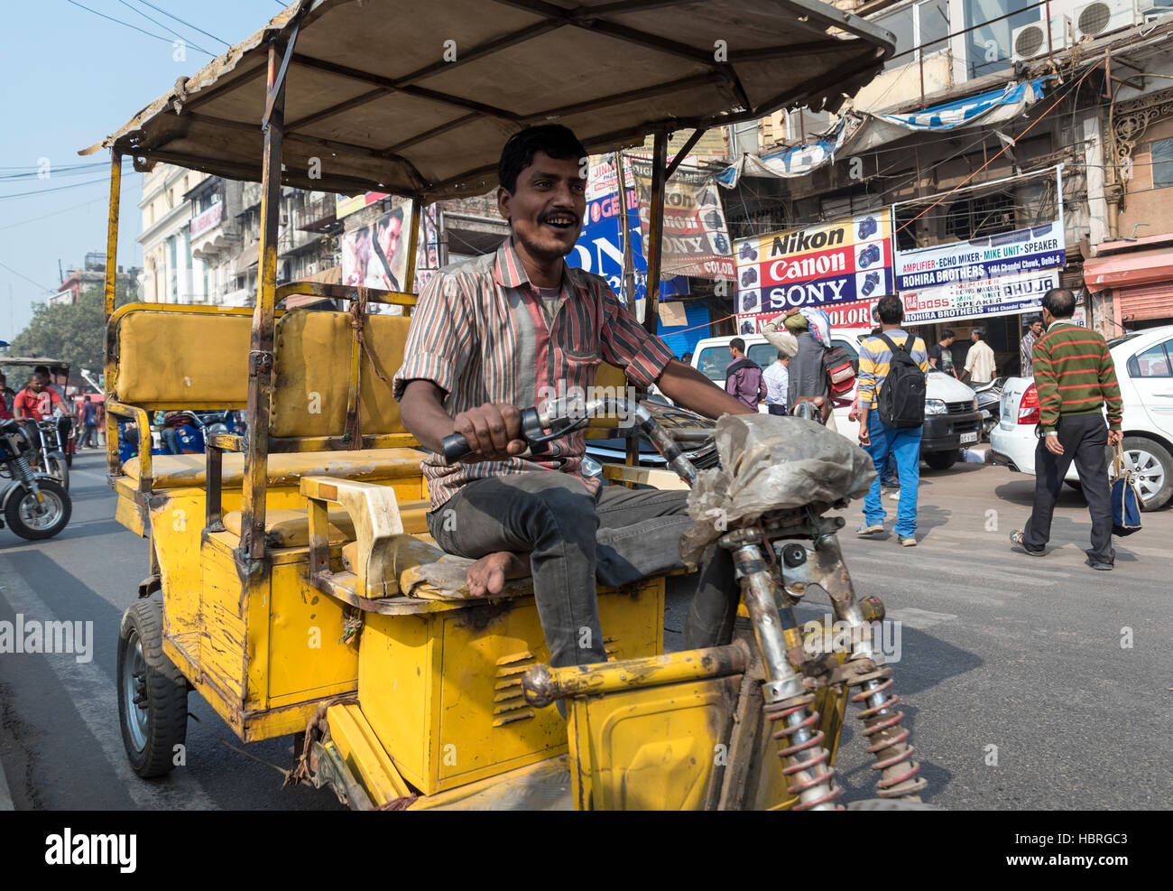 Rickshaw on busy Chandni Chowk street, Old Delhi, India Stock Photo