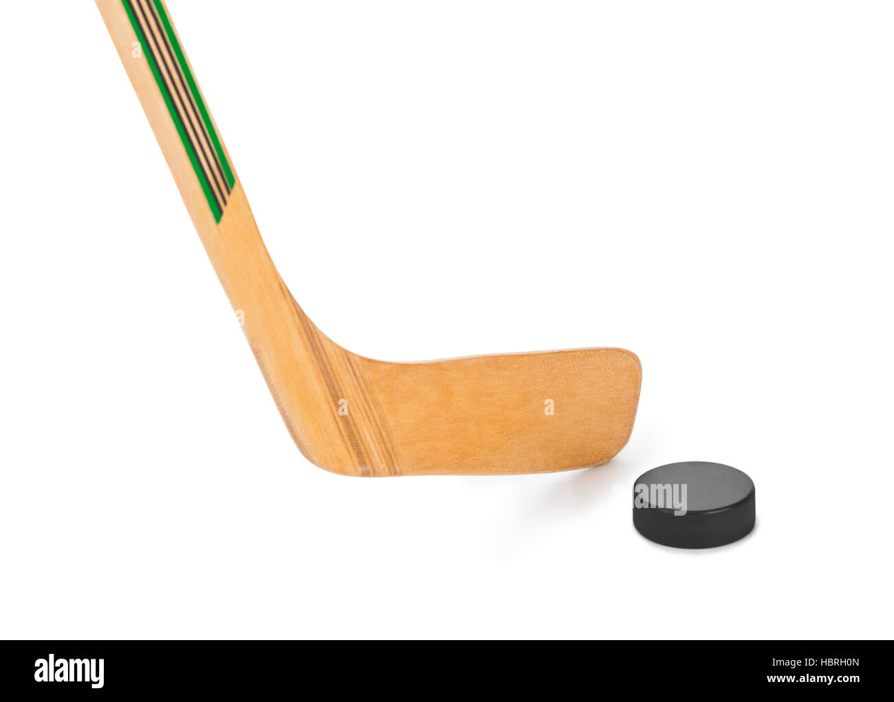 Ice hockey stick and puck Stock Photo Alamy