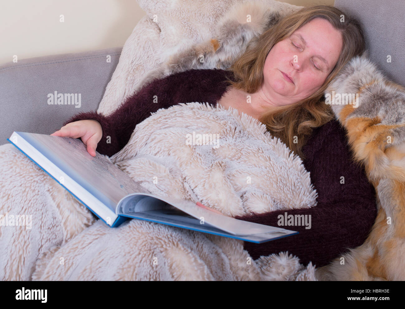 Woman is sick and sleeps Stock Photo