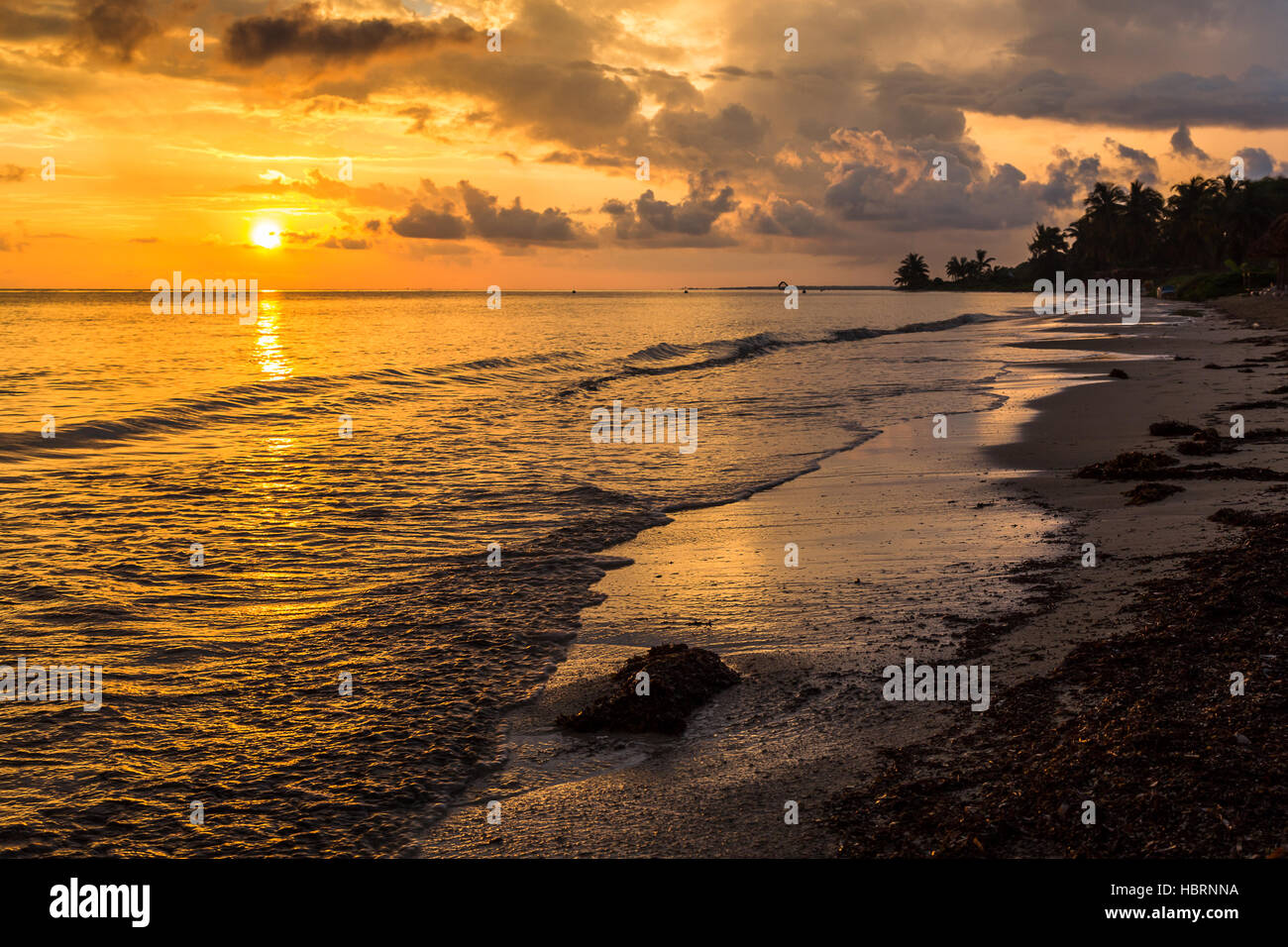 The sun begins to lift over the shallow waters & lagoons of Cayo Guillermo in Cuba. Stock Photo