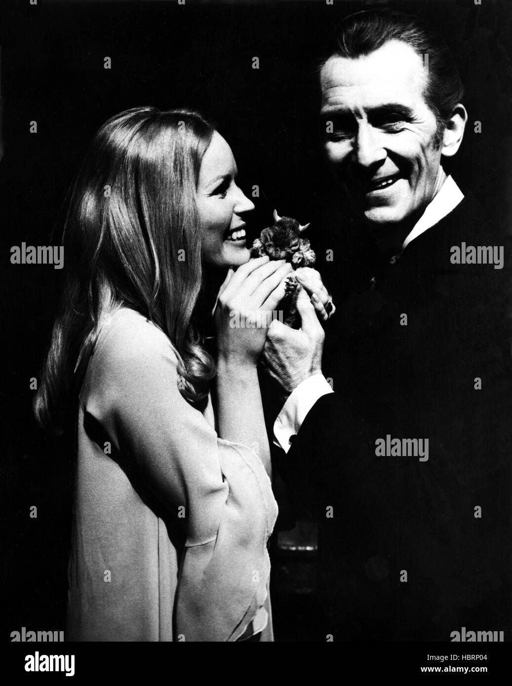 FRANKENSTEIN MUST BE DESTROYED, Veronica Carlson, left, 'Hardnut Wirrel,' center, Peter Cushing, right, behind the scenes, 1969 Stock Photo