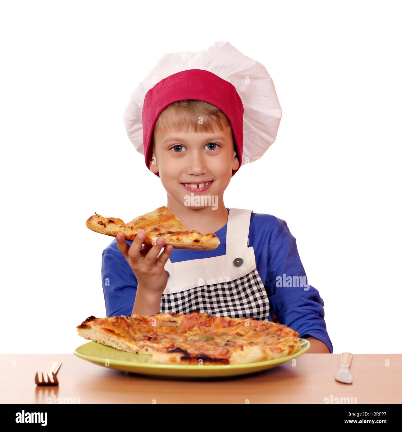 hungry boy chef eat pizza on white Stock Photo