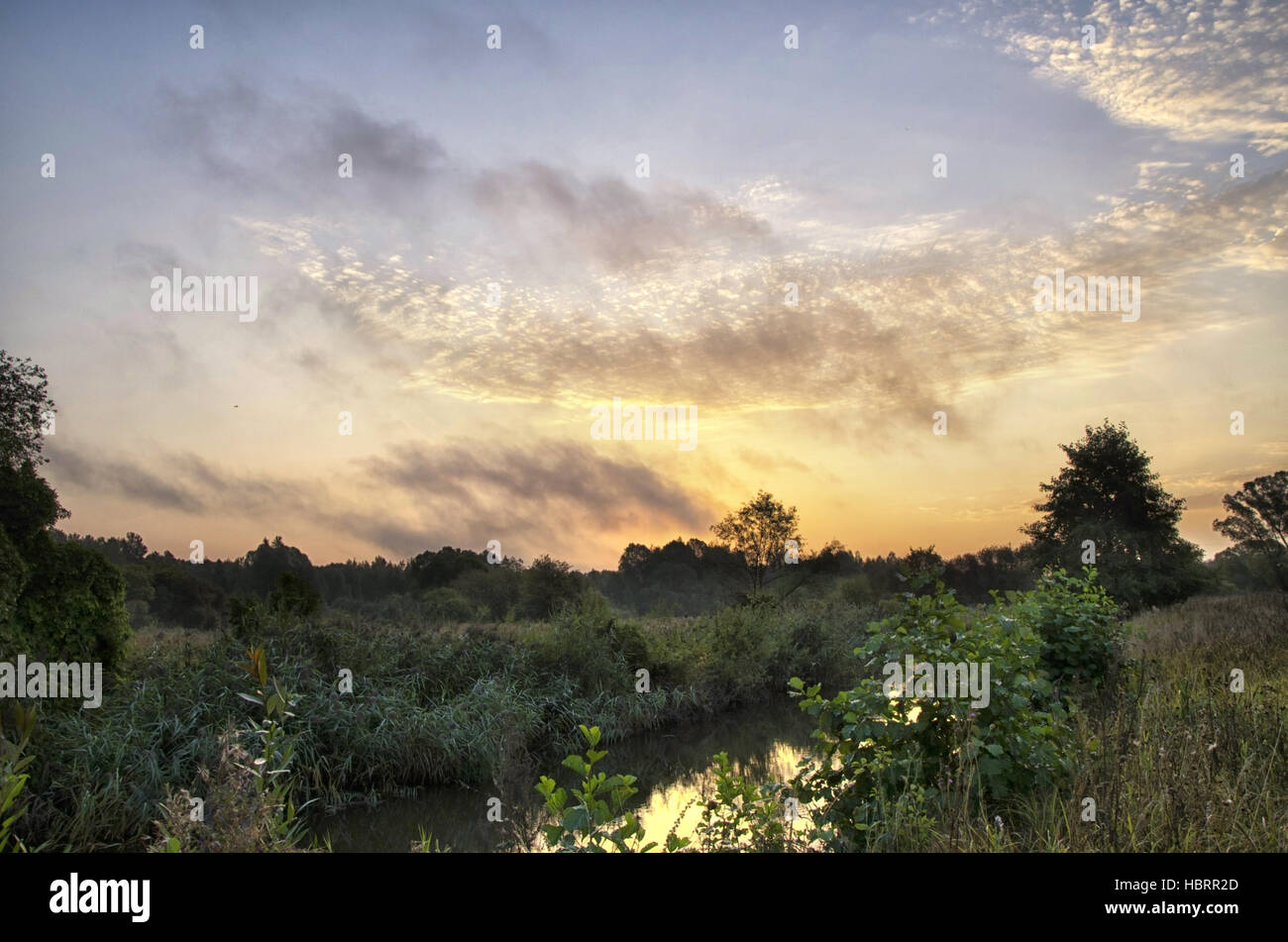 Sunrise over the river Stock Photo - Alamy