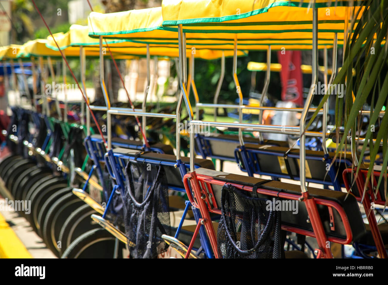 Pedal-powered surreys for rent, Balboa Park, San Diego, California USA Stock Photo