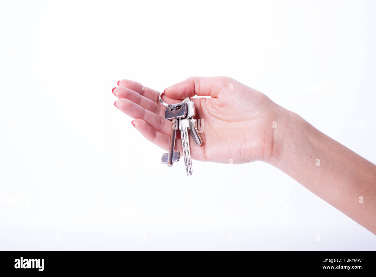 Woman hand holding keys Stock Photo Alamy