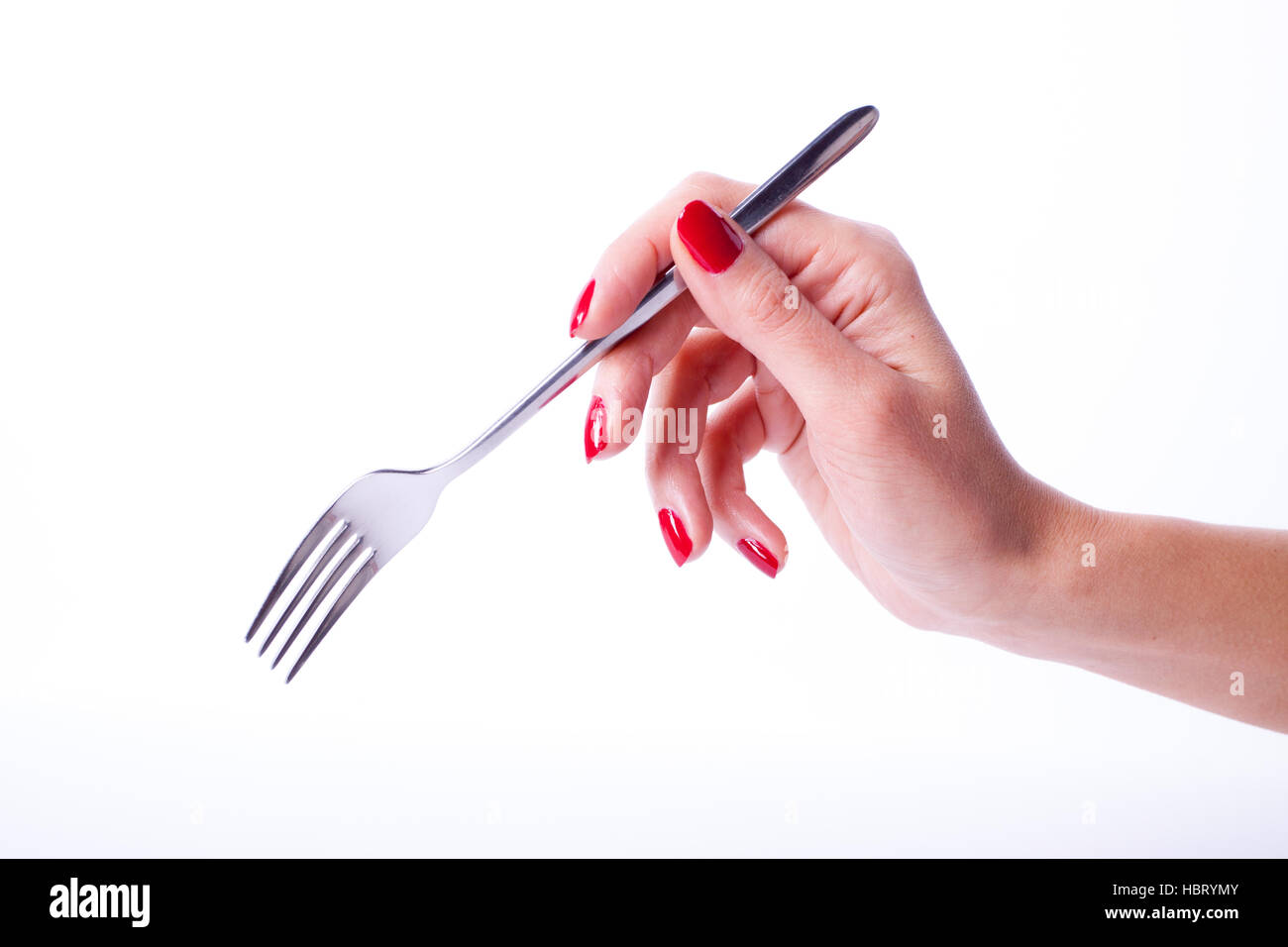 Woman hand holding fork Stock Photo Alamy