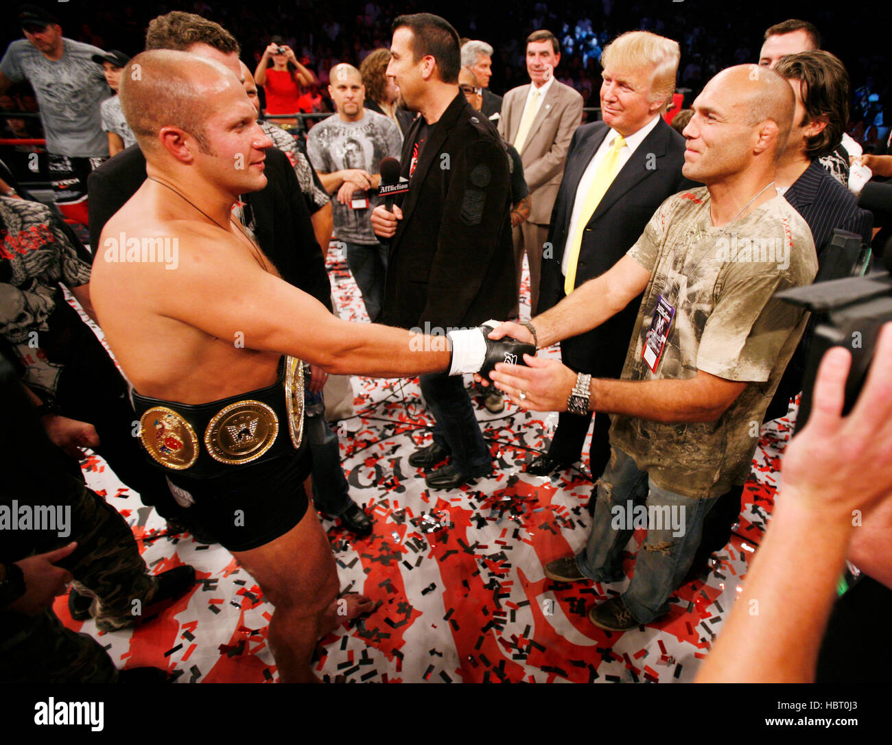 Fedor Emelianenko, left,  greets Randy Couture in the ring after defeating Tim Sylvia at Affliction's 'Banned', a mixed martial arts fight at the Honda Center on July 19, 2008 in Anaheim, California. Donald Trump is show in the yellow tie. Photo by Francis Specker Stock Photo
