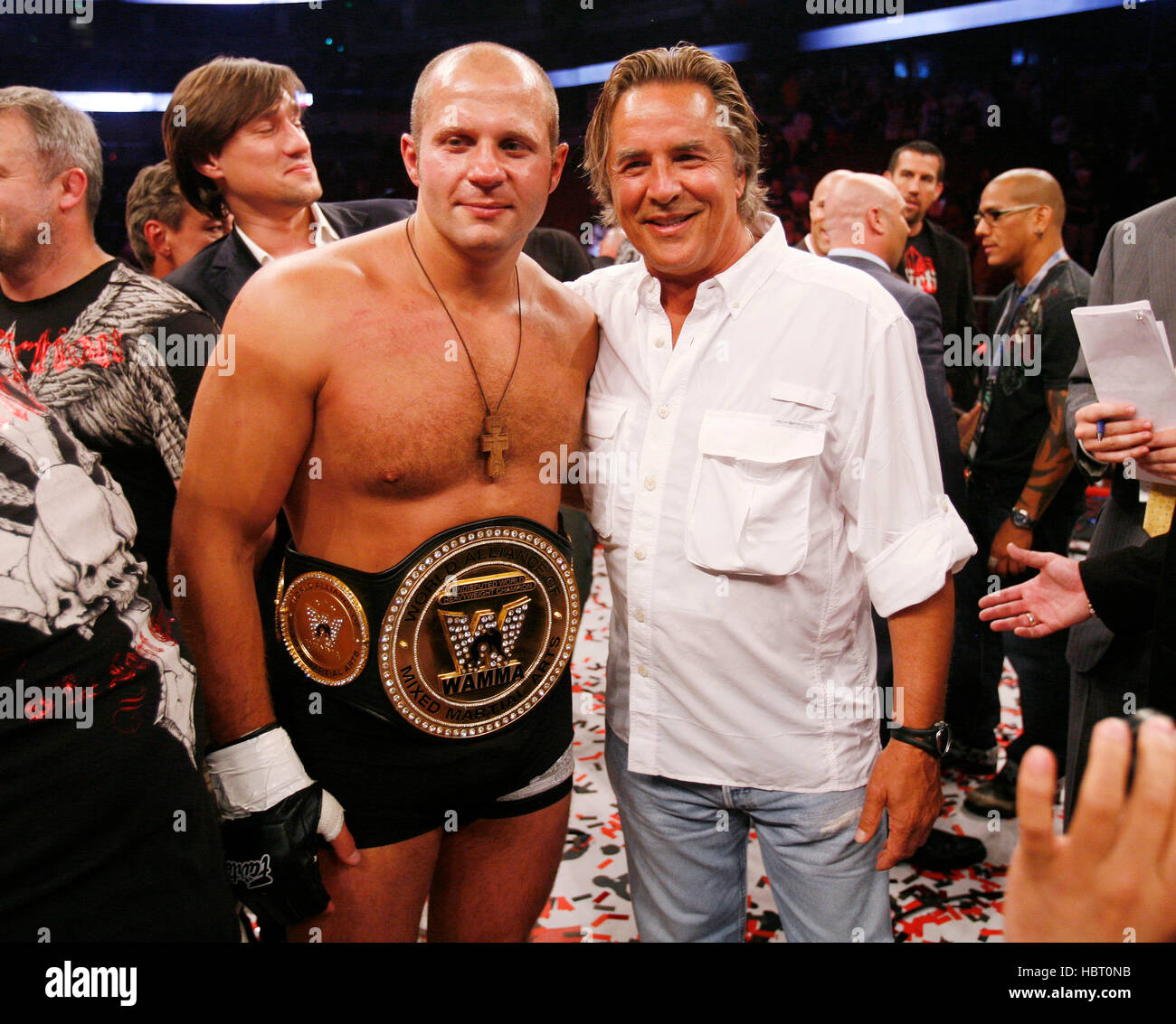 Fedor Emelianenko poses with actor Don Johnson in the ring after defeating Tim Sylvia at Affliction's 'Banned', a mixed martial arts fight at the Honda Center on July 19, 2008 in Anaheim, California. Francis Specker Stock Photo