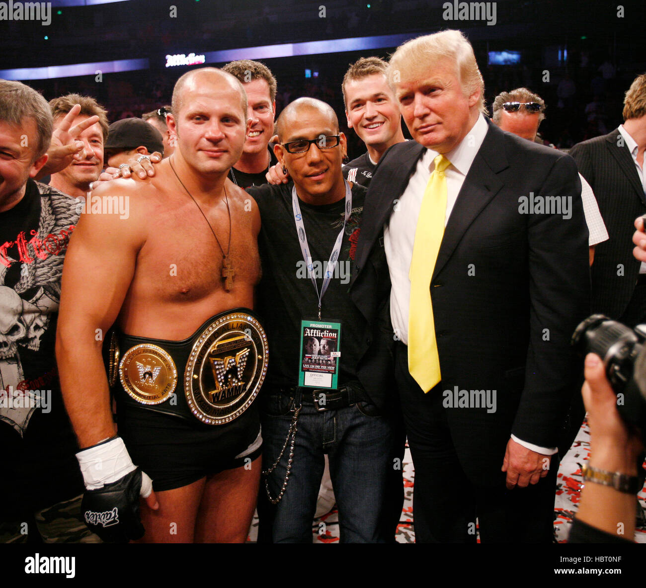 Fedor Emelianenko poses with Tom Atencio, center, and Donald Trump in the ring after defeating Tim Sylvia at Affliction's 'Banned', a mixed martial arts fight at the Honda Center on July 19, 2008 in Anaheim, California. Francis Specker Stock Photo