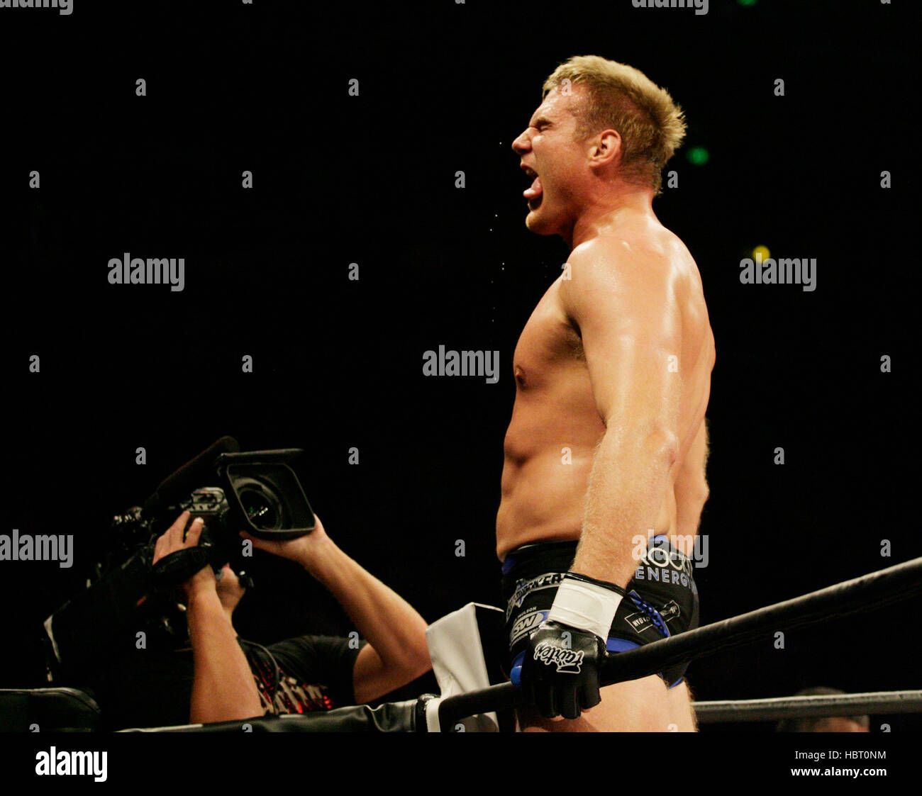 Josh celebrates his victory over Pedro Rizzo at Affliction's