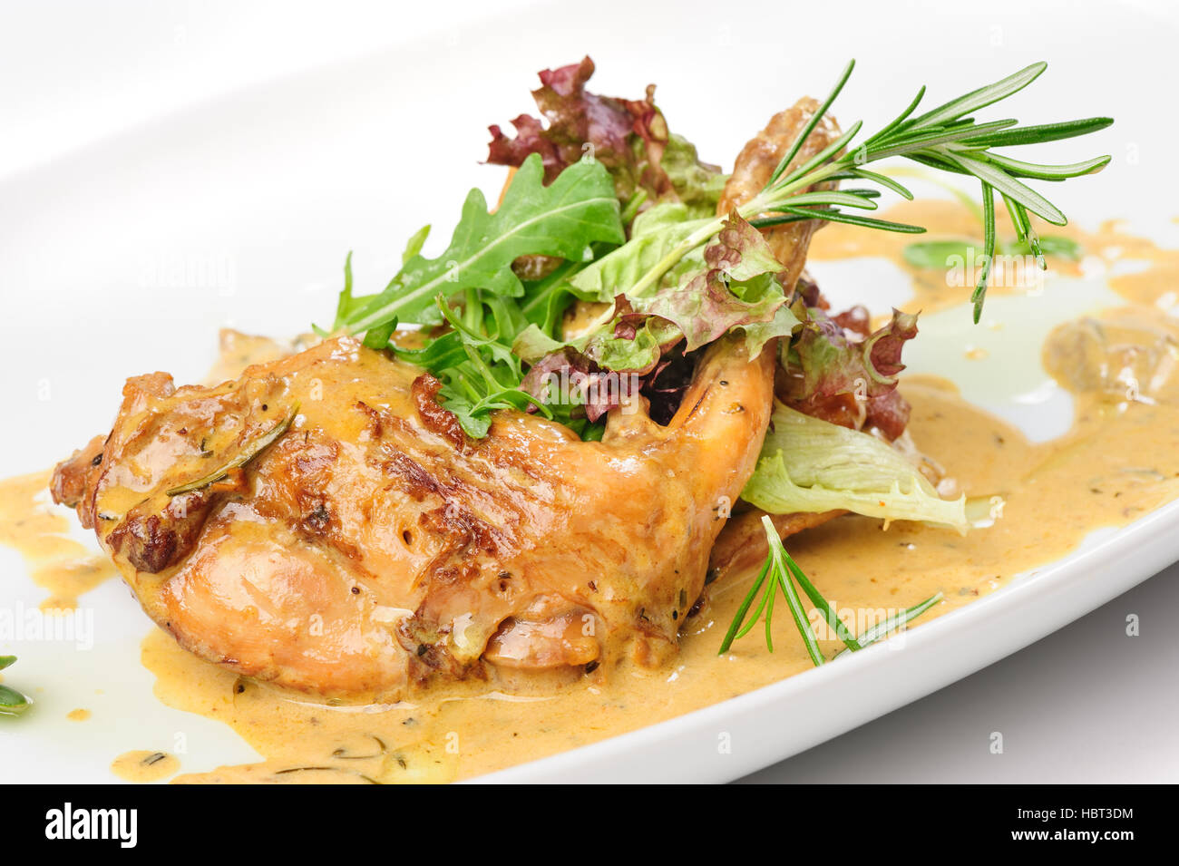 Baked and stewed rabbit legs Stock Photo Alamy