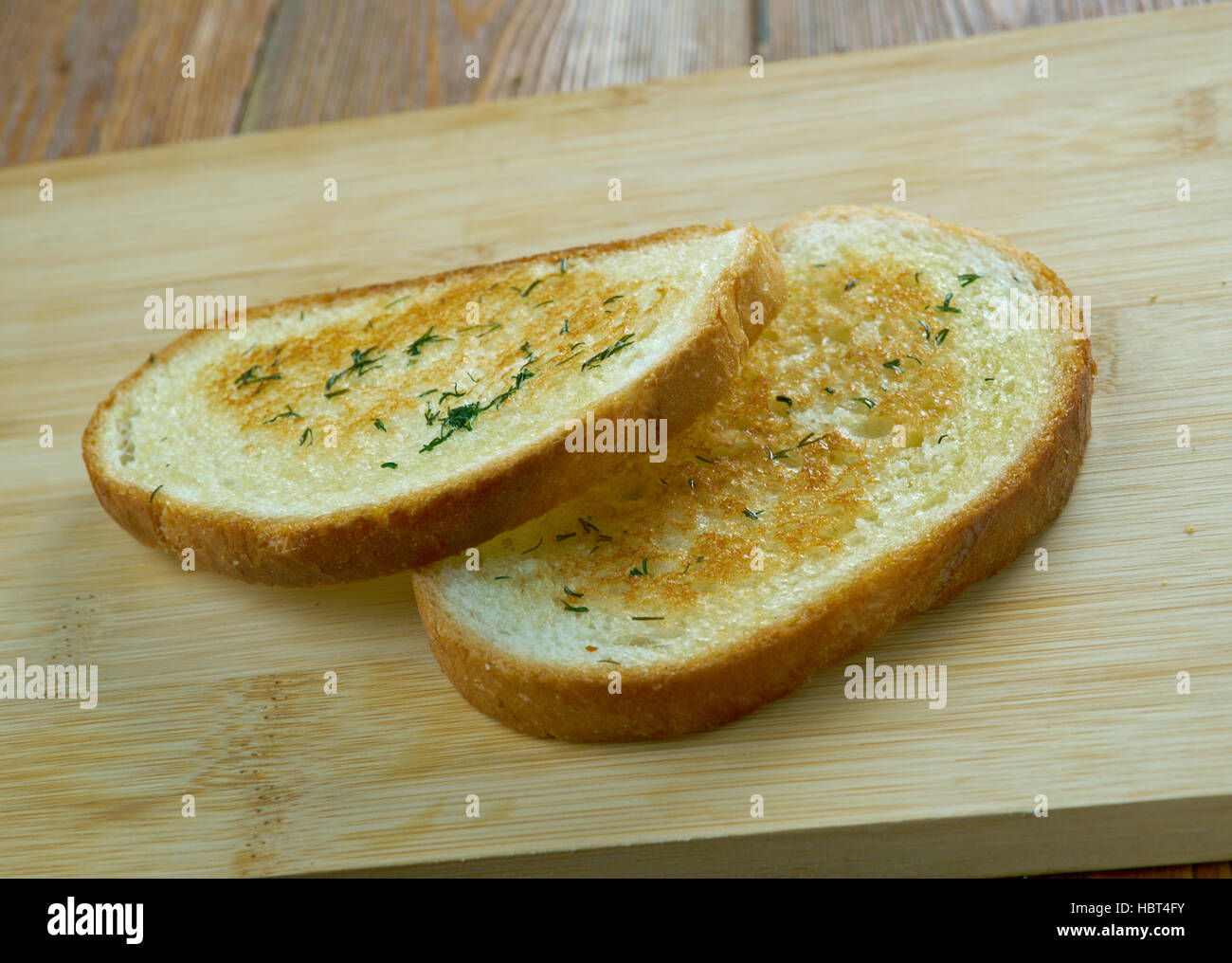 Texas toast toast itself is made by putting butter or margarine on both