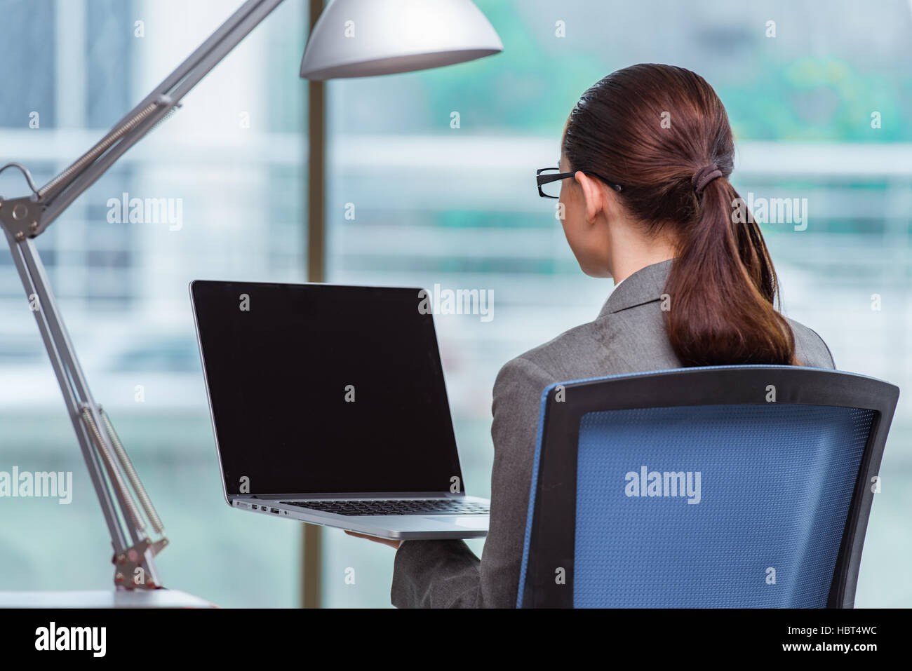 Young assistant working in the office Stock Photo Alamy