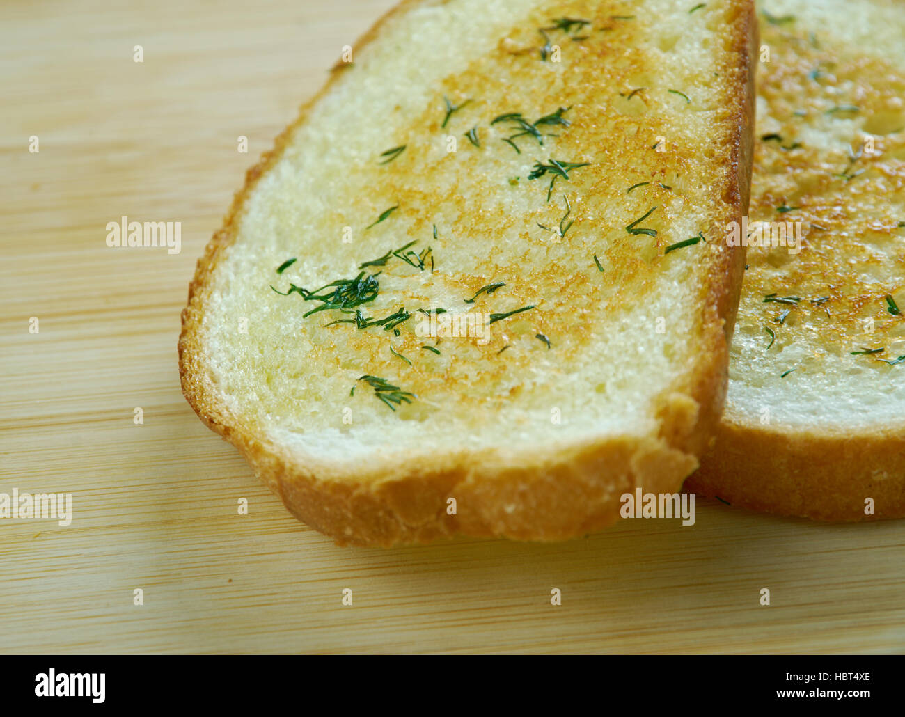 Texas toast toast itself is made by putting butter or margarine on both