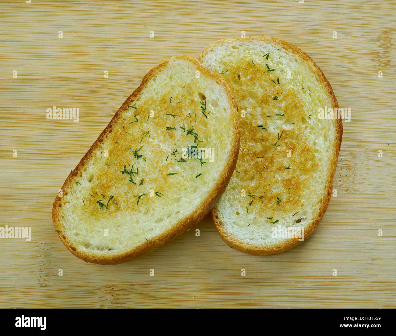 Texas toast toast itself is made by putting butter or margarine on both