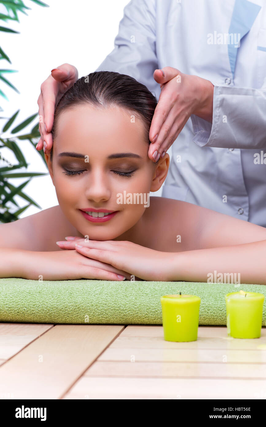 Woman during massage session in spa salon Stock Photo Alamy