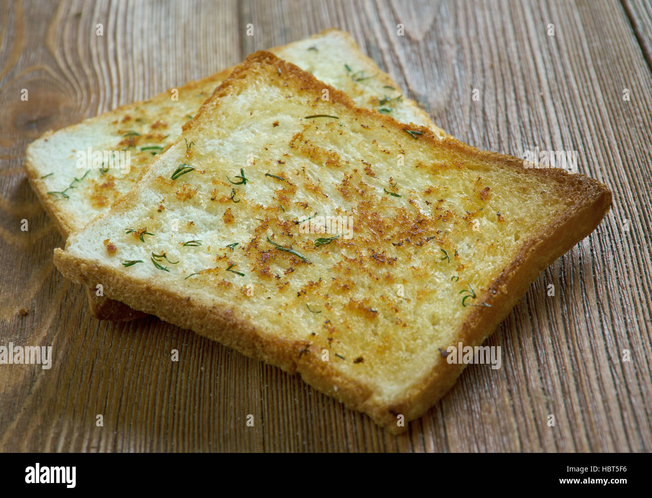 Texas toast toast itself is made by putting butter or margarine on both