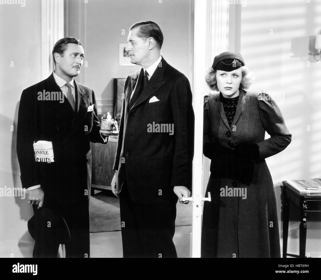 THE GIRL ON THE FRONT PAGE, from left: Edmund Lowe, Gilbert Emery ...