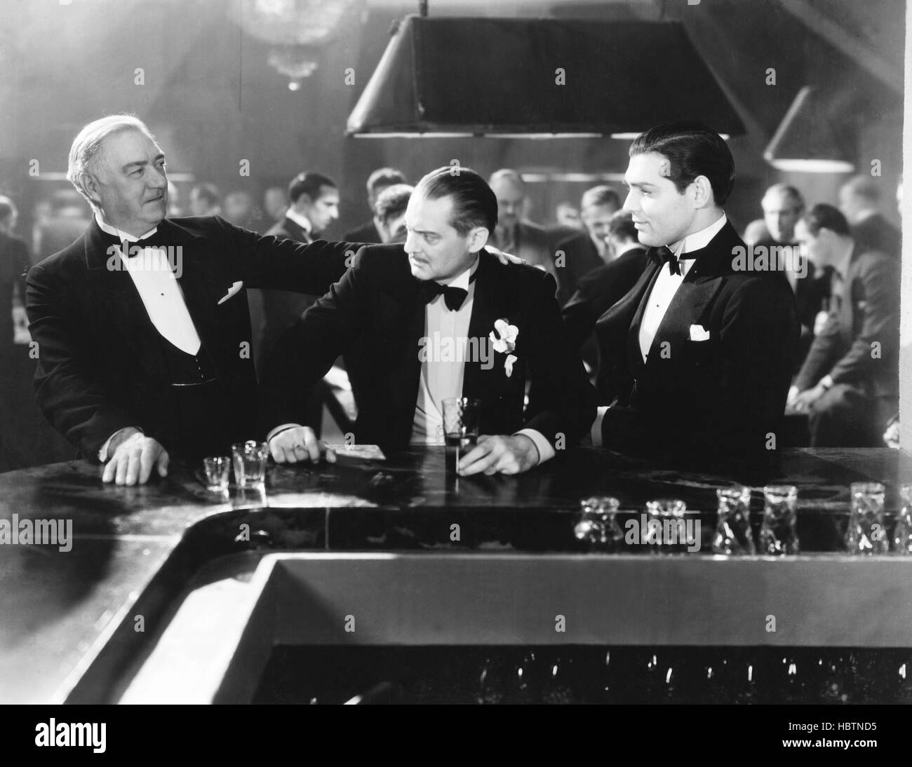 A FREE SOUL, from center left, Lionel Barrymore, Clark Gable, 1931 Stock Photo
