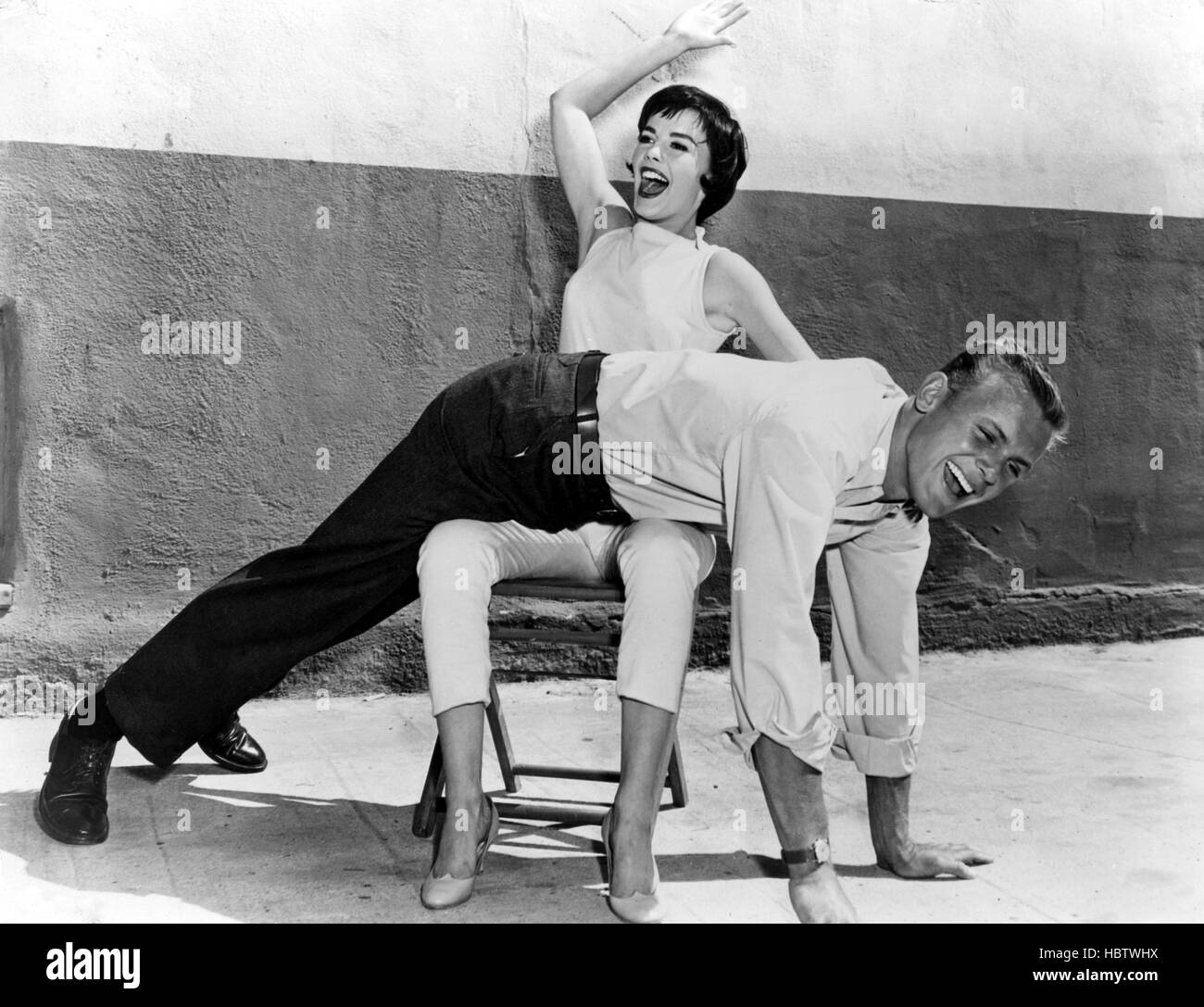 THE GIRL HE LEFT BEHIND, Natalie Wood spanks Tab Hunter in between takes,  1956 Stock Photo - Alamy