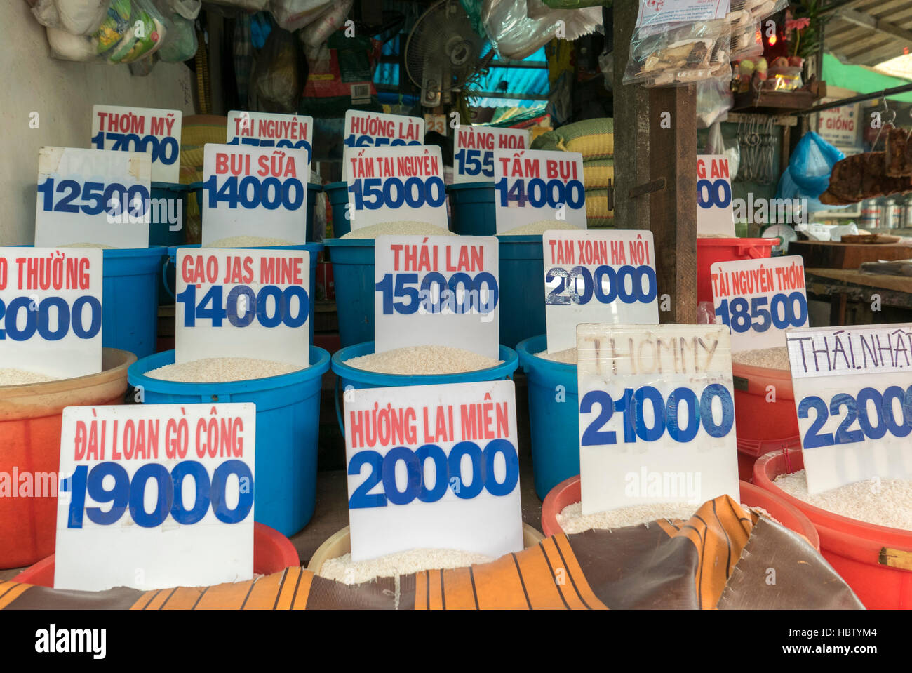 Close up of bags of rice in a local market in Vietnam with price Stock Photo Alamy