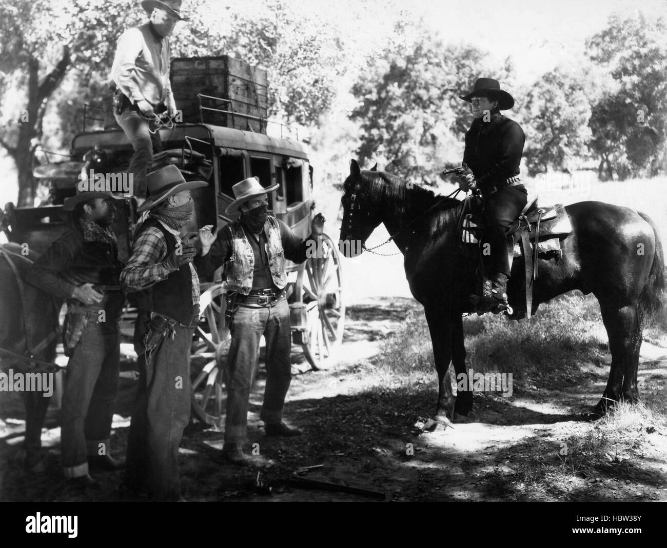 GUN LAW, fifth from left on horse: George O'Brien, 1938 Stock Photo - Alamy