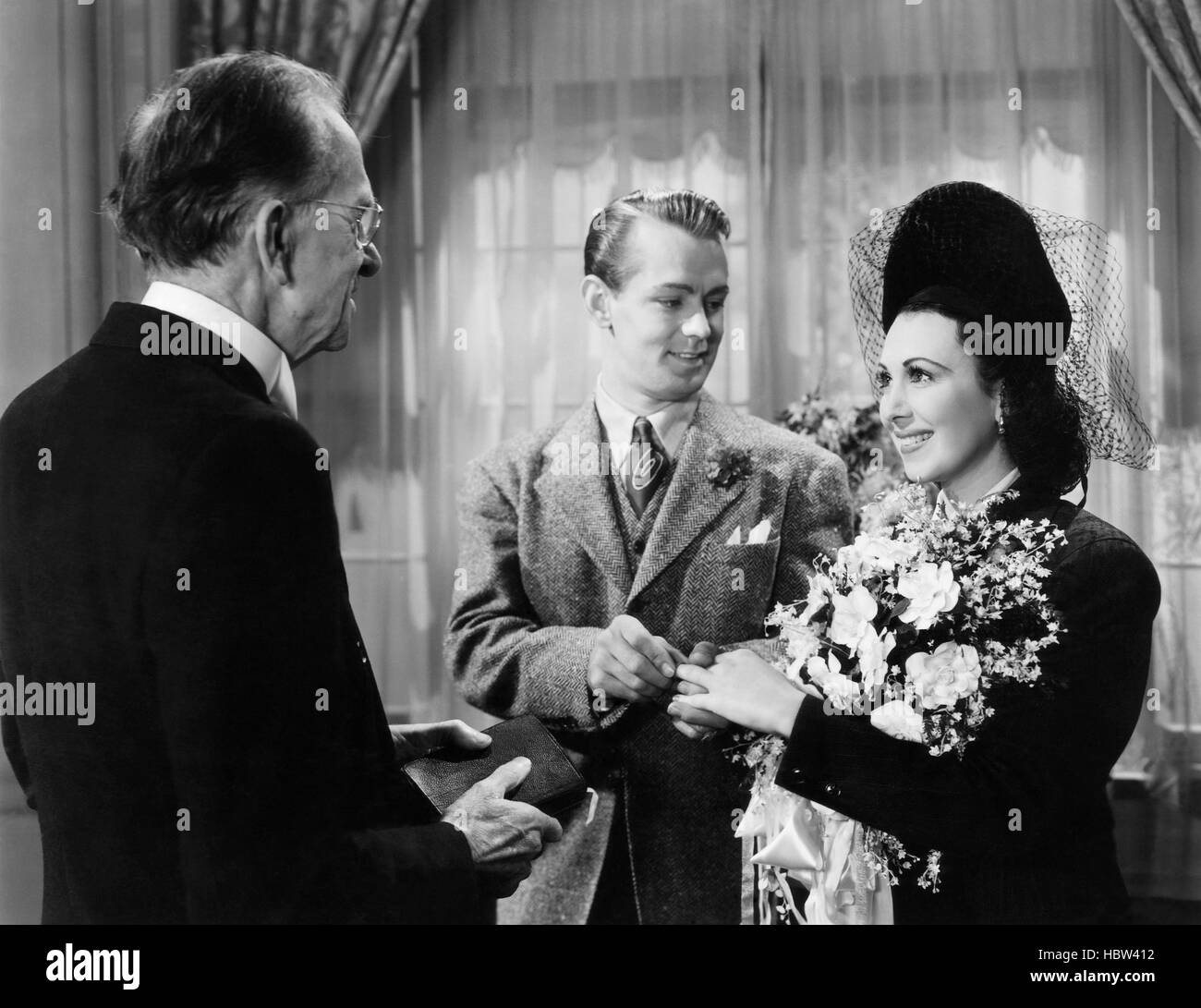 HER FIRST ROMANCE, Alan Ladd (center), Julie Bishop (as Jacqueline ...