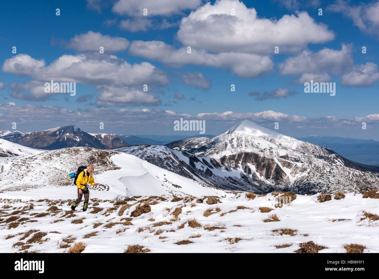 alone tourist in high mountain Stock Photo