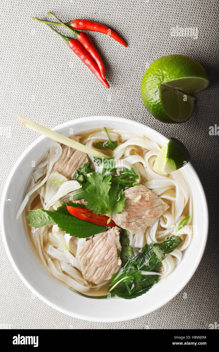 Vietnamese noodle pho bo soup overhead Stock Photo - Alamy