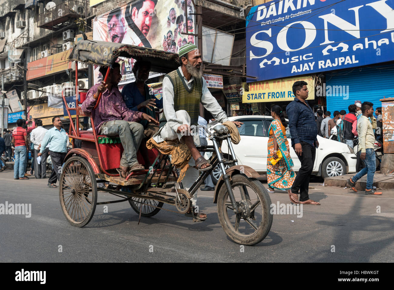 Cycle rickshaw on Chandni Chowk street, Old Delhi, India Stock Photo