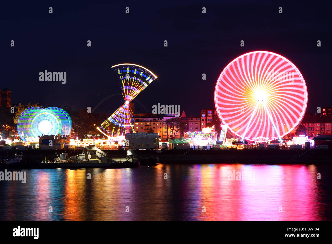 Carnival rides night swing ferris wheel hi-res stock photography and ...