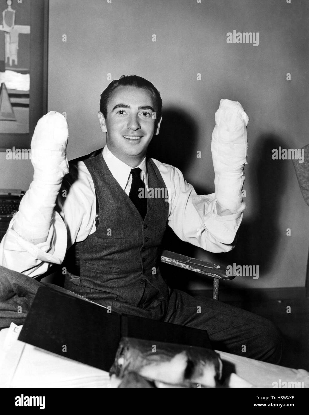 HAZARD, Macdonald Carey waiting for makeup person to put finishing