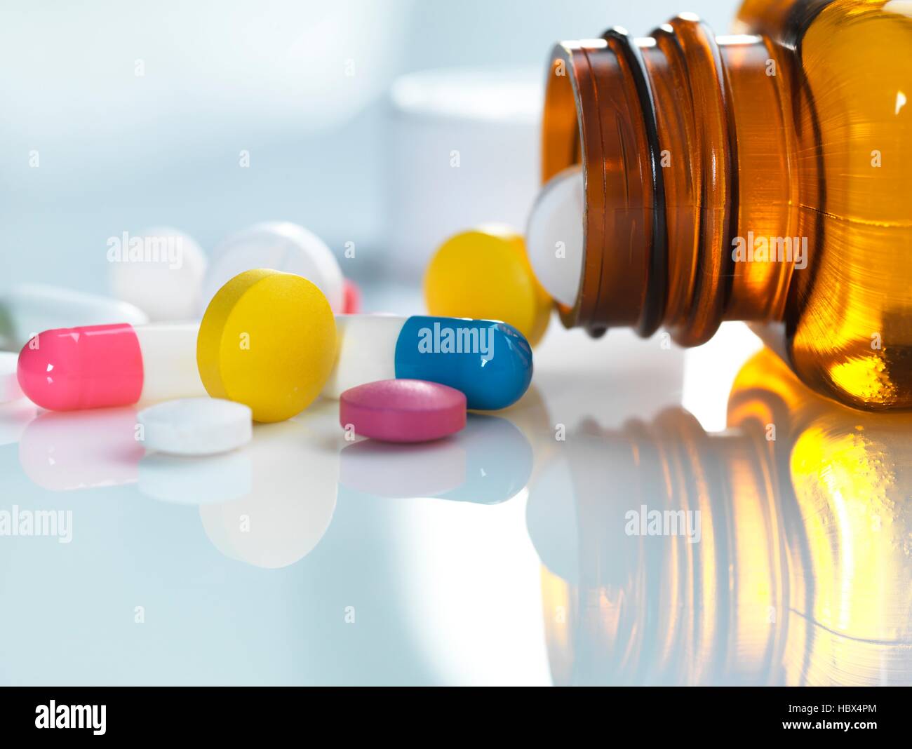 Download A Variety Of Pills And Capsules Spilling Out Of A Bottle Stock Photo Alamy Yellowimages Mockups