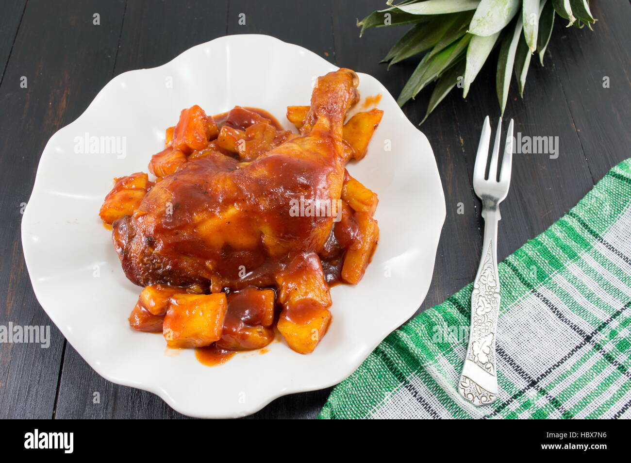 pineapple chicken thigs with barbeque and chilli sauce Stock Photo