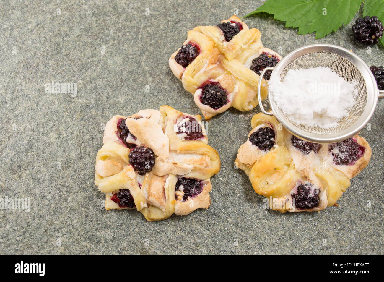 blackberry puff pastry with vanila pudding on a table Stock Photo