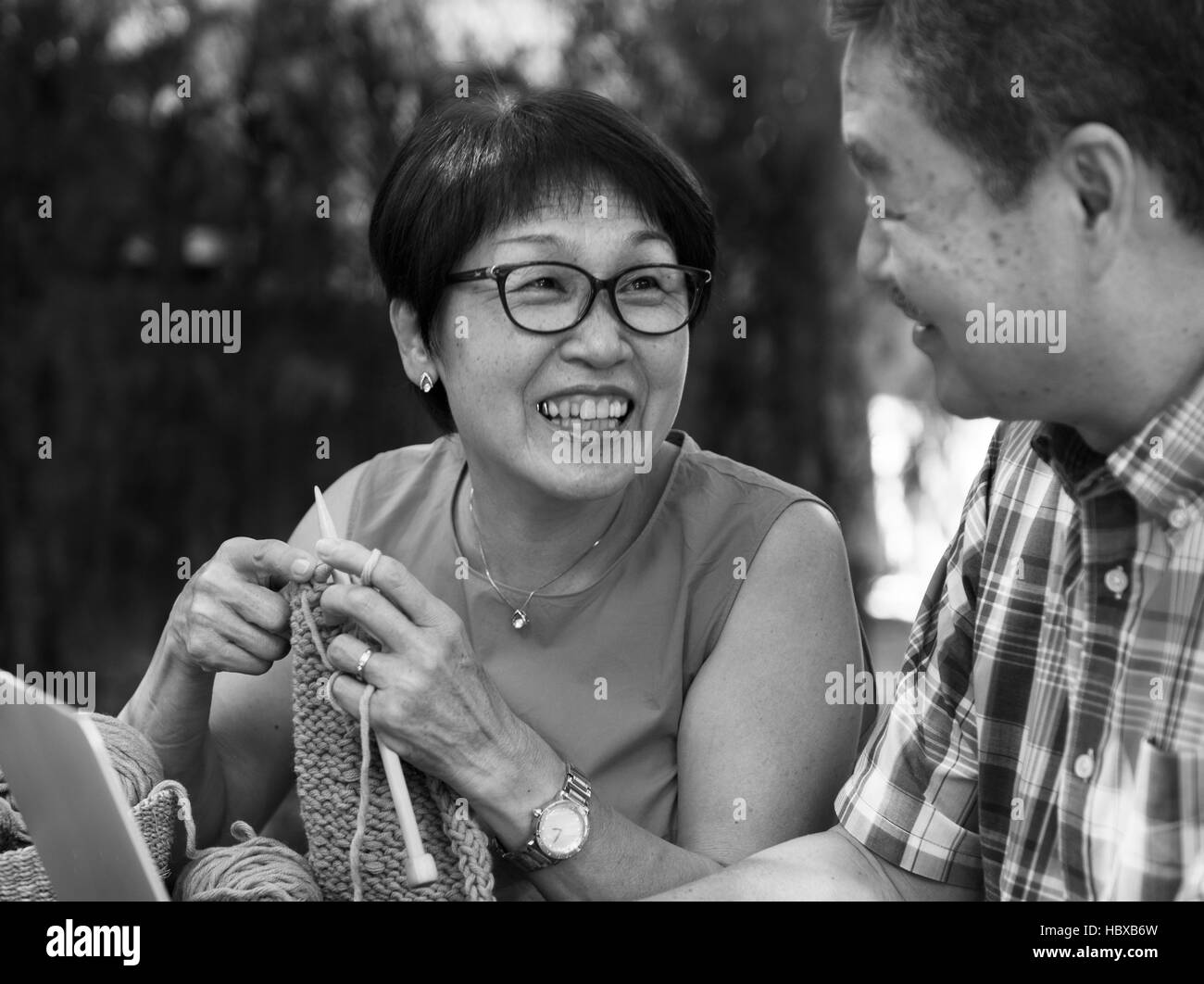 Senior man sitting using Black and White Stock Photos & Images - Alamy