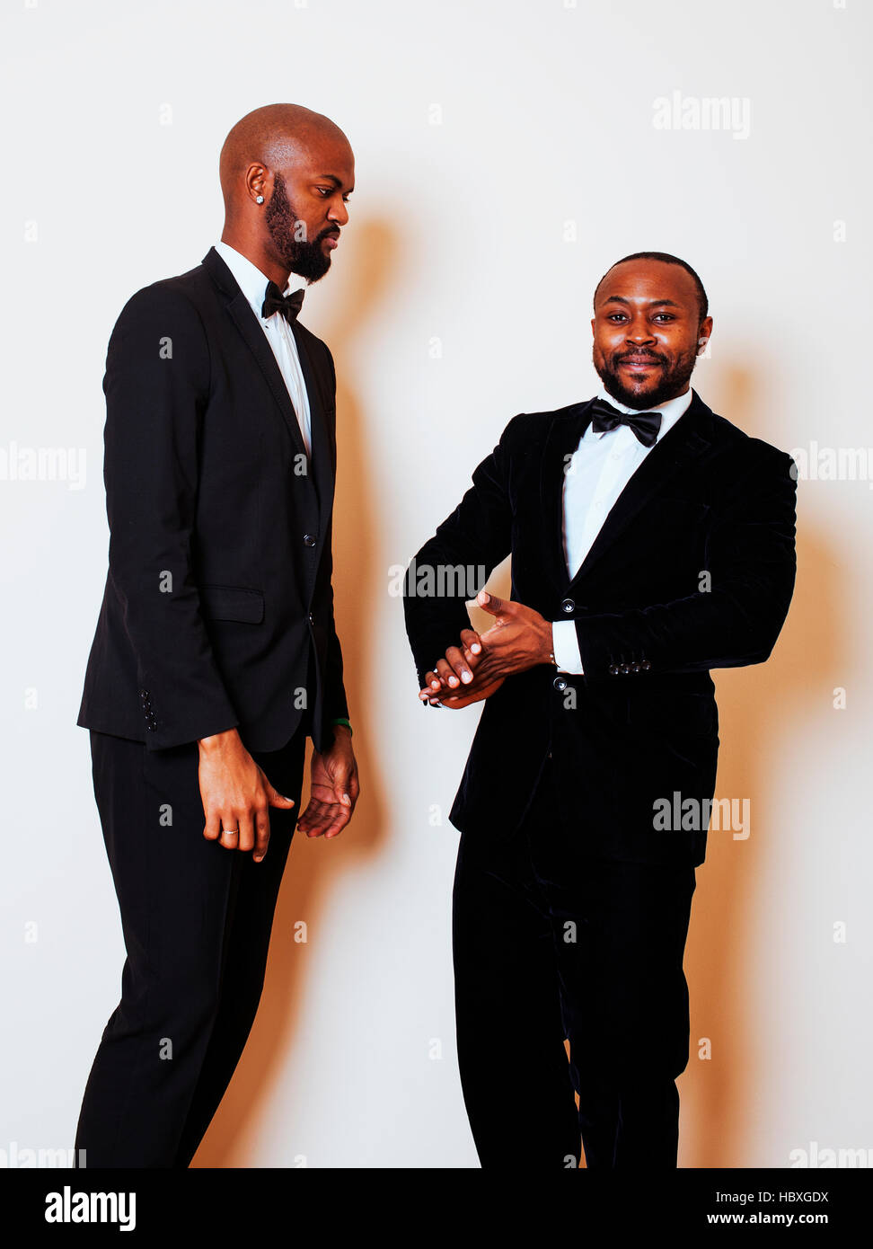 two afro-american businessmen in black suits emotional posing, g Stock ...