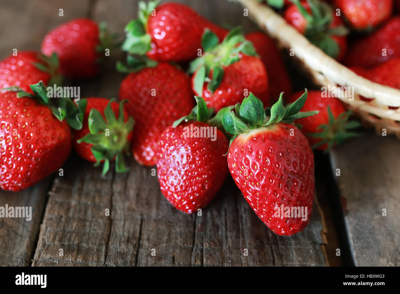 strawberries on a wooden background Stock Photo - Alamy